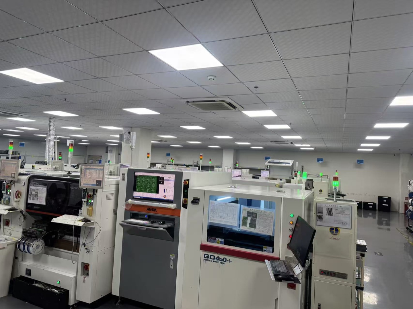 SMT assembly line with solder paste printing and placement equipment